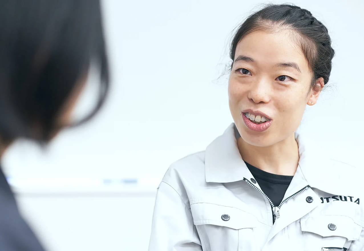 Tさんに語り掛けるMさん